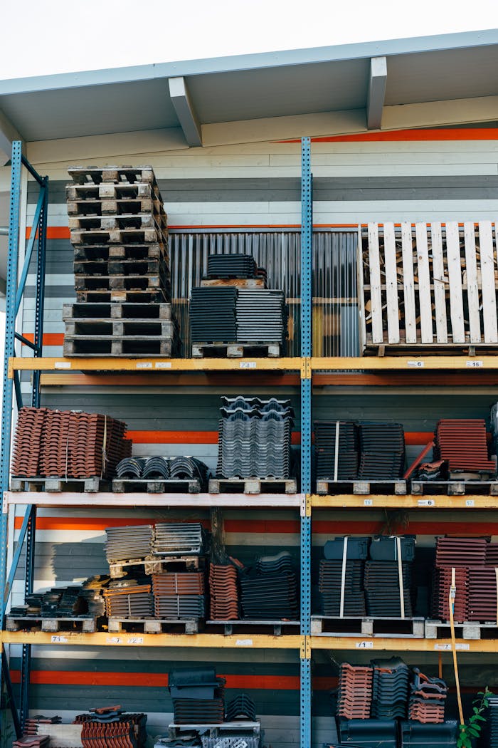 Crafting Captivating Headlines: Your awesome post title goes here Neatly stacked building materials in a warehouse setting, showcasing construction organization.